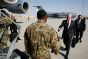 U.S. Defense Secretary James Mattis greets an airman as he boards a U.S. Air Force C-17 Globemaster for a trip to the U.S. military base in Djibouti from Doha, Qatar, April 23, 2017 (Pool photo by Jonathan Ernst via AP).