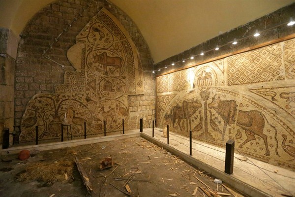 Ancient mosaics, which were damaged by shelling, inside a 17th-century caravanserai, Maaret al-Numan, Idlib province, Syria, Feb. 26, 2013 (AP photo by Hussein Malla).