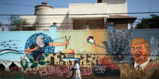 Graffiti showing U.S. President Donald Trump with a footprint on his face and Arabic that reads, "For Jerusalem and the right of return, we resist," Gaza City, May 20, 2018 (AP photo by Khalil Hamra).