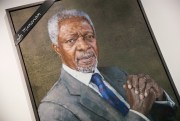 A black ribbon adorns the portrait of former United Nations Secretary-General Kofi Annan at U.N. headquarters, New York, Aug. 18, 2018 (AP photo by Mary Altaffer).