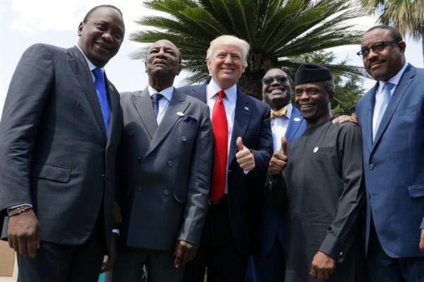 U.S. President Donald Trump poses with African leaders, including Kenyan President Uhuru Kenyatta, at the Group of Seven summit, Taormina, Italy, May 27, 2017 (AP photo by Andrew Medichini).