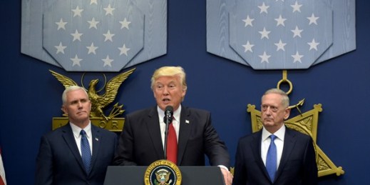 U.S. President Donald Trump, flanked by Vice President Mike Pence and Defense Secretary James Mattis, speaks during an event at the Pentagon, Washington, Jan. 27, 2017 (AP photo by Susan Walsh).
