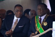 Zimbabwean President Emmerson Mnangagwa, right, sits with Vice President Constantino Chiwenga during a Heroes’ Day event in Harare, Aug. 13, 2018 (AP photo by Tsvangirayi Mukwazhi).