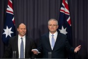 Australia’s Prime Minister Scott Morrison, right, gestures while speaking with Deputy Leader of the Liberal Party Josh Frydenberg during their first press conference at Parliament House in Canberra, Aug. 24, 2018 (AP photo by Andrew Taylor).