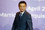 Jack Ma, the founder and chairman of Alibaba, leaves a press conference in Bangkok, Thailand, April 19, 2018 (AP photo by Sakchai Lalit).
