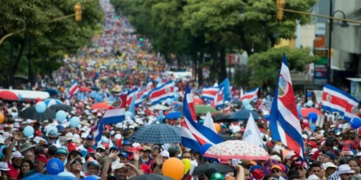 Thousands of people march to demand that Costa Rican President Carlos Alvarado scrap a proposed fiscal reform before congress that includes new taxes, in the streets of San Jose, Costa Rica, Sept. 12, 2018 (AP Photo by Carlos Gonzalez).