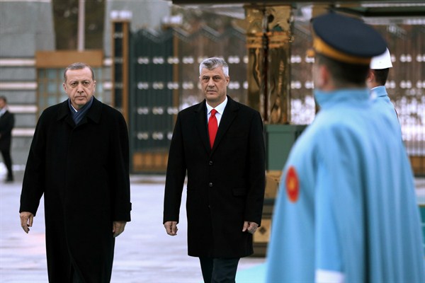 Turkish President Recep Tayyip Erdogan, left, and Hashim Thaci, the president of Kosovo, inspect a military honor guard in Ankara, Turkey, Dec. 29, 2016 (AP photo by Kayhan Ozer).