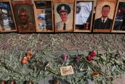 A memorial is set up to mark the second anniversary of fighting in Ilovaysk between Ukrainian soldiers and pro-Ukraine paramilitaries and pro-Russia insurgents, Kiev, Ukraine, Aug. 29, 2016 (Sipa photo via AP).