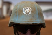 A member of the German armed forces wears a helmet that features the United Nations logo at Camp Castor in Gao, Mali, April 5, 2016 (Photo by Michael Kappeler for DPA via AP Images).