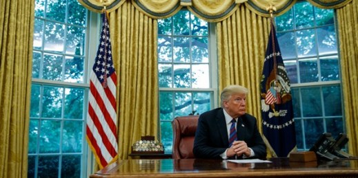 President Donald Trump talks on the phone with Mexican President Enrique Pena Nieto in the Oval Office of the White House, Washington, Aug. 27, 2018 (AP photo by Evan Vucci).