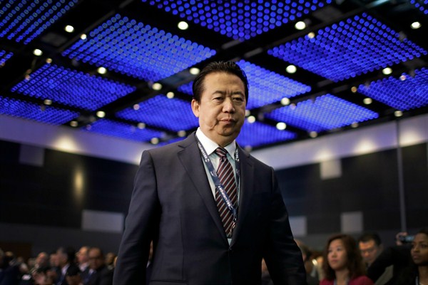Interpol President Meng Hongwei walks toward the stage to deliver his opening address at the Interpol World Congress in Singapore, July 4, 2017 (AP photo by Wong Maye-E).