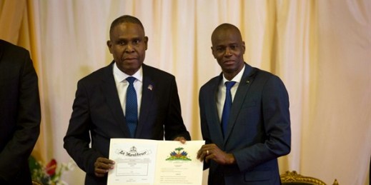 Haiti’s new Prime Minister Jean-Henry Ceant, left, poses for a picture with Haiti’s President Jovenel Moise during his ratification ceremony at the national palace in Port-au-Prince, Haiti, Sept. 17, 2018 (AP photo by Dieu Nalio Chery).