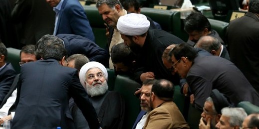 Iranian President Hassan Rouhani, center, speaks with the lawmakers during a parliamentary session, Tehran, Oct. 27, 2018 (AP photo by Ebrahim Noroozi).