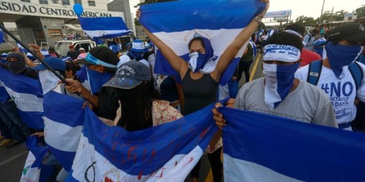 Anti-government protesters march outside Central American University, Managua, Nicaragua, Sept. 26, 2018 (AP photo by Alfredo Zuniga).