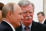 Russian President Vladimir Putin, left, and U.S. National Security Adviser John Bolton during their meeting in the Kremlin, Moscow, Russia, Oct. 23, 2018 (AP photo by Alexander Zemlianichenko).
