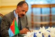 Eritrean President Isaias Afwerki signs a peace accord with Ethiopia in Jiddah, Saudi Arabia, Sept. 16, 2018 (Saudi Press Agency photo via AP Images).