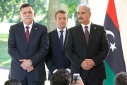 Libyan Prime Minister Fayez al-Sarraj, left, French President Emmanuel Macron, center, and Khalifa Haftar of the Libyan National Army, right, at a conference in France, July 25, 2017 (AP photo by Michel Euler).
