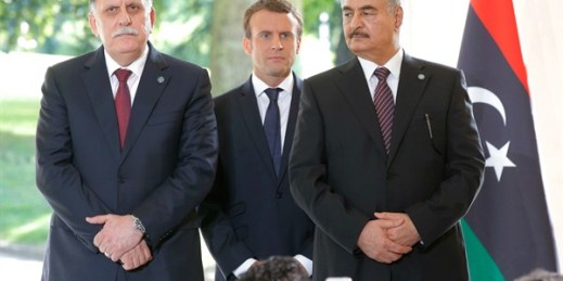 Libyan Prime Minister Fayez al-Sarraj, left, French President Emmanuel Macron, center, and Khalifa Haftar of the Libyan National Army, right, at a conference in France, July 25, 2017 (AP photo by Michel Euler).