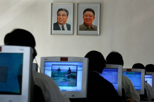 North Korean students use computers in a classroom with portraits of the country’s later leaders Kim Il Sung, left, and his son Kim Jong Il hanging on the wall, Pyongyang, North Korea, Sept. 20, 2012 (AP photo by Vincent Yu).