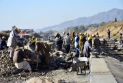 Workers at the site of a Chinese-backed infrastructure project in Haripur, Pakistan, Dec. 22, 2017 (AP photo by Aqeel Ahmed).