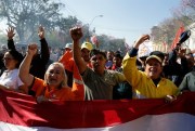 Thousands of workers and retirees protest against a proposed pension reform, Asuncion, Paraguay, Aug. 23, 2018 (AP photo by Jorge Saenz).