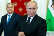 Russian President Vladimir Putin, right, at a press conference with Hungarian Prime Minister Viktor Orban after their talks in the Kremlin, Moscow, Russia, Sept. 18, 2018 (AP photo by Alexander Zemlianichenko).