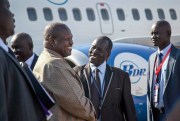 South Sudan’s opposition leader, Riek Machar, center-left, is greeted as he arrives at the airport in Juba, South Sudan, Oct. 31, 2018 (AP photo by Bullen Chol).