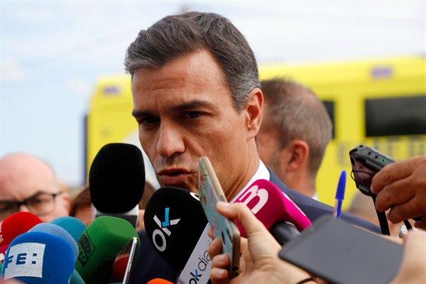 Spanish Prime Minister Pedro Sanchez gives a press conference after a conversation with people affected by flooding, Sant Llorenc des Cardassar, Spain, Oct. 10, 2018 (Photo by Clara Margais for DPA via AP Images).