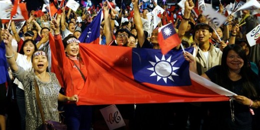Supporters of the opposition Kuomintang cheer in Kaohsiung, Taiwan, Nov. 24, 2018 (AP photo).