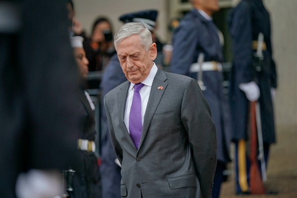 U.S. Defense Secretary Jim Mattis waits for Chinese Minister of Defense Gen. Wei Fenghe before an arrival ceremony at the Pentagon, Nov. 9, 2018 (AP photo by Pablo Martinez Monsivais).