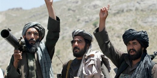 Taliban fighters react to a speech by their senior leader in the Shindand district of Herat province, Afghanistan, May 27, 2016 (AP photo by Allauddin Khan).