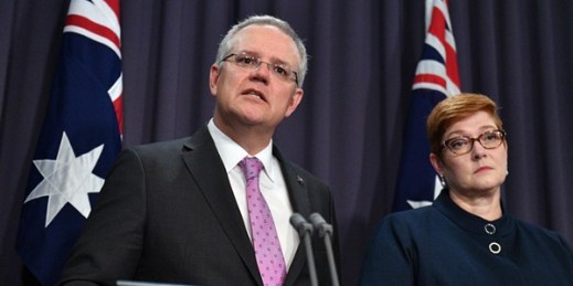 Australian Prime Minister Scott Morrison, left, speaks to the media alongside Foreign Minister Marise Payne during a press conference at the Parliament House in Canberra, Oct. 16, 2018 (Photo by Mick Tsikas for AAP via AP Images).