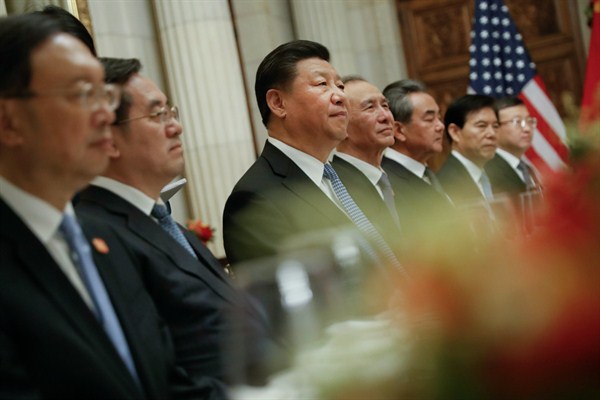 Chinese President Xi Jinping, center, and members of his official delegation listen to U.S. President Donald Trump speak during their bilateral meeting at the G-20 summit, Buenos Aires, Argentina, Dec. 1, 2018 (AP photo by Pablo Martinez Monsivais).