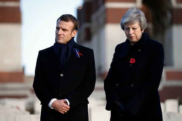 French President Emmanuel Macron, left, and British Prime Minister Theresa May at the Thiepval Memorial in northern France, Nov. 9, 2018 (AP photo by Francois Mori).