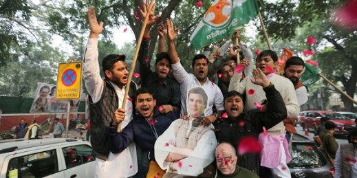 Supporters of India’s opposition Congress party hold a cut-out of party leader Rahul Gandhi as they celebrate outside the party headquarters in New Delhi, India, Dec. 11, 2018 (AP photo).