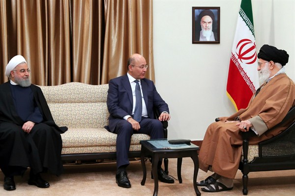 Iraqi President Barham Salih, center, Iranian Supreme Leader Ayatollah Ali Khamenei, right, and Iranian President Hassan Rouhani during their meeting in Tehran, Iran, Nov. 17, 2018 (Office of the Iranian Supreme Leader photo via AP Images).