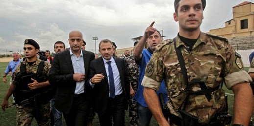 Lebanese Foreign Minister Gebran Bassil leaves a stadium after a tour organized for diplomats and journalists, Beirut, Oct. 1, 2018 (Photo by Marwan Naamani for dpa via AP Images).