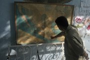 An asylum-seeker at the Hermanos en el Camino shelter studies a map of Mexico, Ixtepec, Oaxaca, June 17, 2016 (Photo by Joseph Sorrentino).