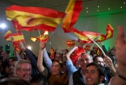 Supporters of Spain’s far-right Vox party celebrate the results of regional elections in Andalusia, Seville, Spain, Dec. 2, 2018 (AP photo by Gogo Lobato).