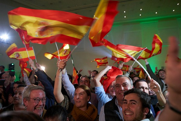 Supporters of Spain’s far-right Vox party celebrate the results of regional elections in Andalusia, Seville, Spain, Dec. 2, 2018 (AP photo by Gogo Lobato).