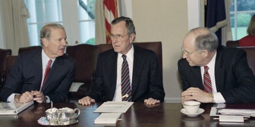 President George H.W. Bush, flanked by Secretary of State James A. Baker III, left, and Defense Secretary Dick Cheney, in the Cabinet Room of the White House, March 19, 1992 (AP photo by J. Scott Applewhite).