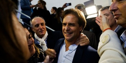 Uruguayan presidential hopeful for the Nacional Party, Luis Lacalle Pou, center, celebrates in his headquarters after being elected candidate for his party, in Montevideo, Uruguay, June 30, 2019 (AP photo by Matilde Campodonico).*