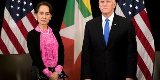 U.S. Vice President Mike Pence, right, with Myanmar’s leader, Aung San Suu Kyi, in Singapore, Nov. 14, 2018 (AP photo by Bernat Armangue).