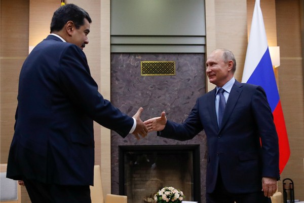 Russian President Vladimir Putin, right, greets Venezuelan President Nicolas Maduro at the Novo-Ogaryovo residence outside Moscow, Russia, Dec. 5, 2018 (pool photo by Maxim Shemetov via AP Images).
