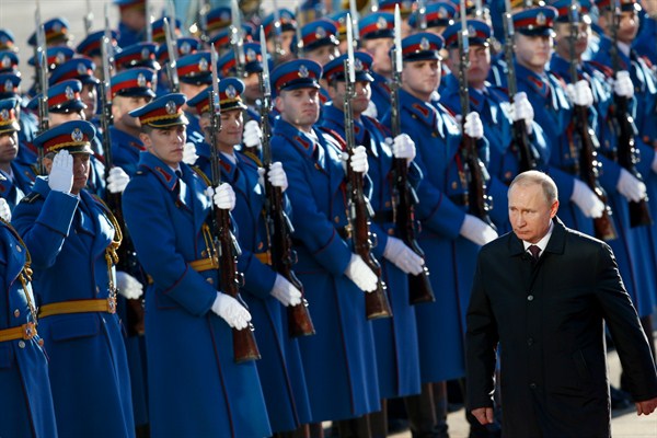Russian President Vladimir Putin reviews an honor guard during an official welcome ceremony in Belgrade, Serbia, Jan. 17, 2019 (AP photo by Darko Vojinovic).