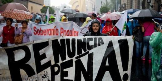 Teachers march in the rain in Mexico City, June 3, 2016 (AP photo by Eduardo Verdugo).