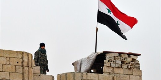 A Syrian army soldier outside Manbij, Aleppo Province, Syria (Sputnik photo via AP Images).