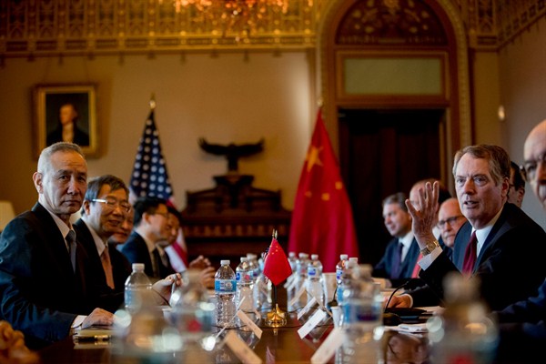 U.S. Trade Representative Robert Lighthizer, right, accompanied by Trump administration officials, meets with Chinese Vice Premier Liu He, left, and other Chinese officials in Washington, Jan. 30, 2019 (AP photo by Andrew Harnik).