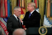 U.S. President Donald Trump and James Mattis, then the secretary of defense, during a reception in the East Room at the White House, Washington, Oct. 25, 2018 (AP photo by Manuel Balce Ceneta).