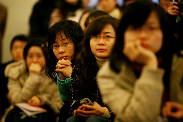 Chinese students listen to a speech at Chongqing University, Dec. 20, 2007 (Photo by Andrew Parsons for Press Association via AP Images).
